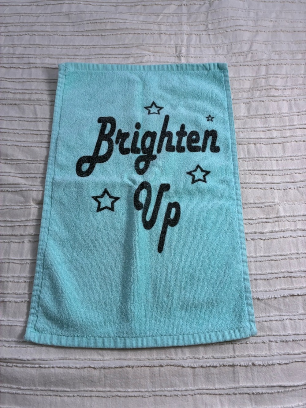 Brighten Up Aqua turquoise coloured hand Towel. EUC. Cute!